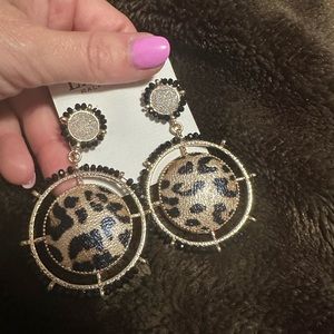 Cheetah print earrings for pierced ears.